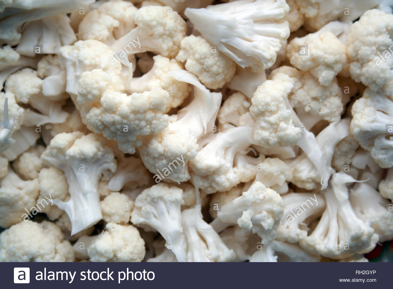 Heap Of White Cauliflower Background Top Stock Photo