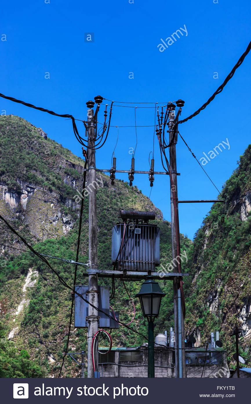 Transformer On A Pole Background Of Mountains Stock Photo