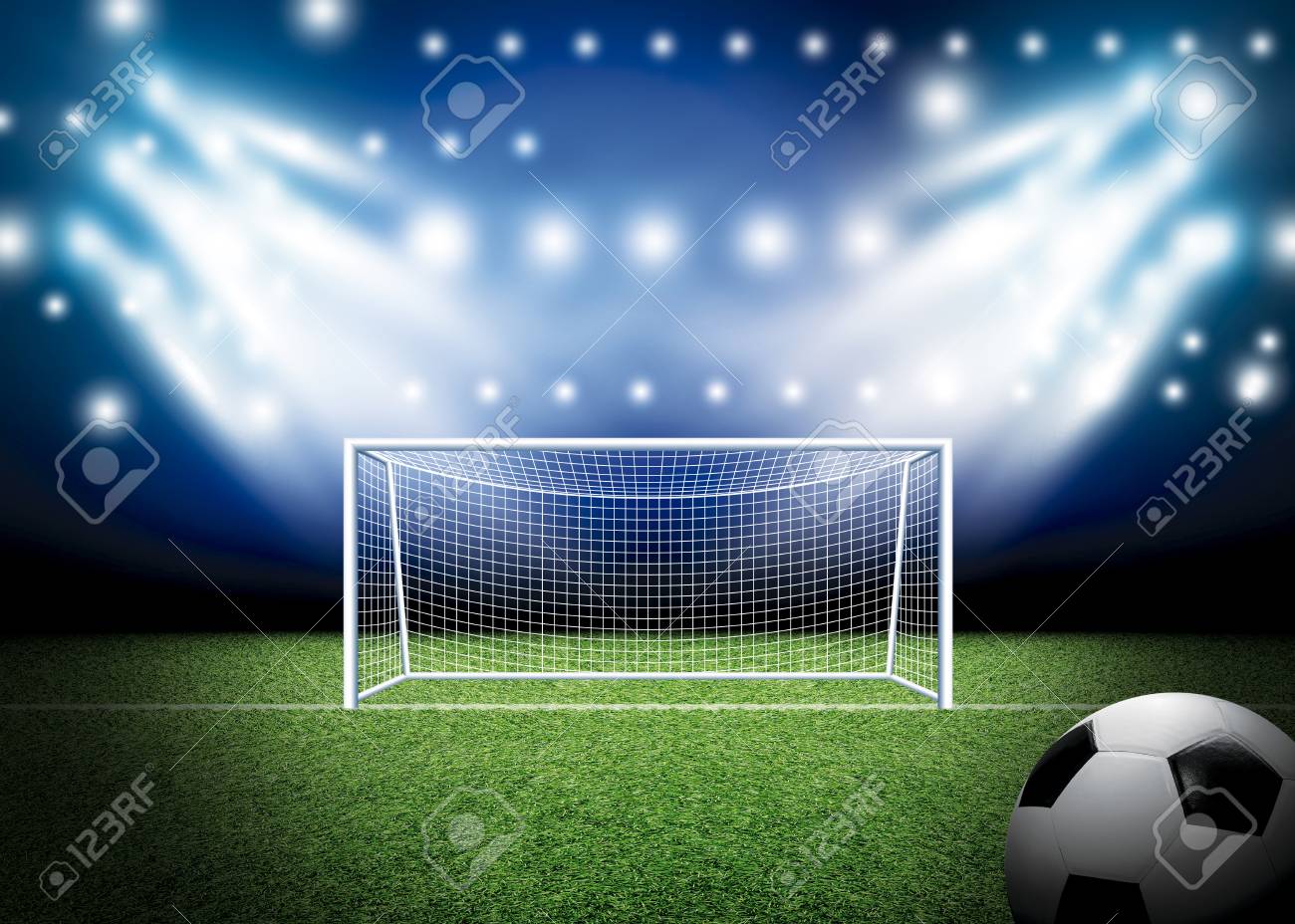Soccer Goal And Football With Spotlight Background In Stadium