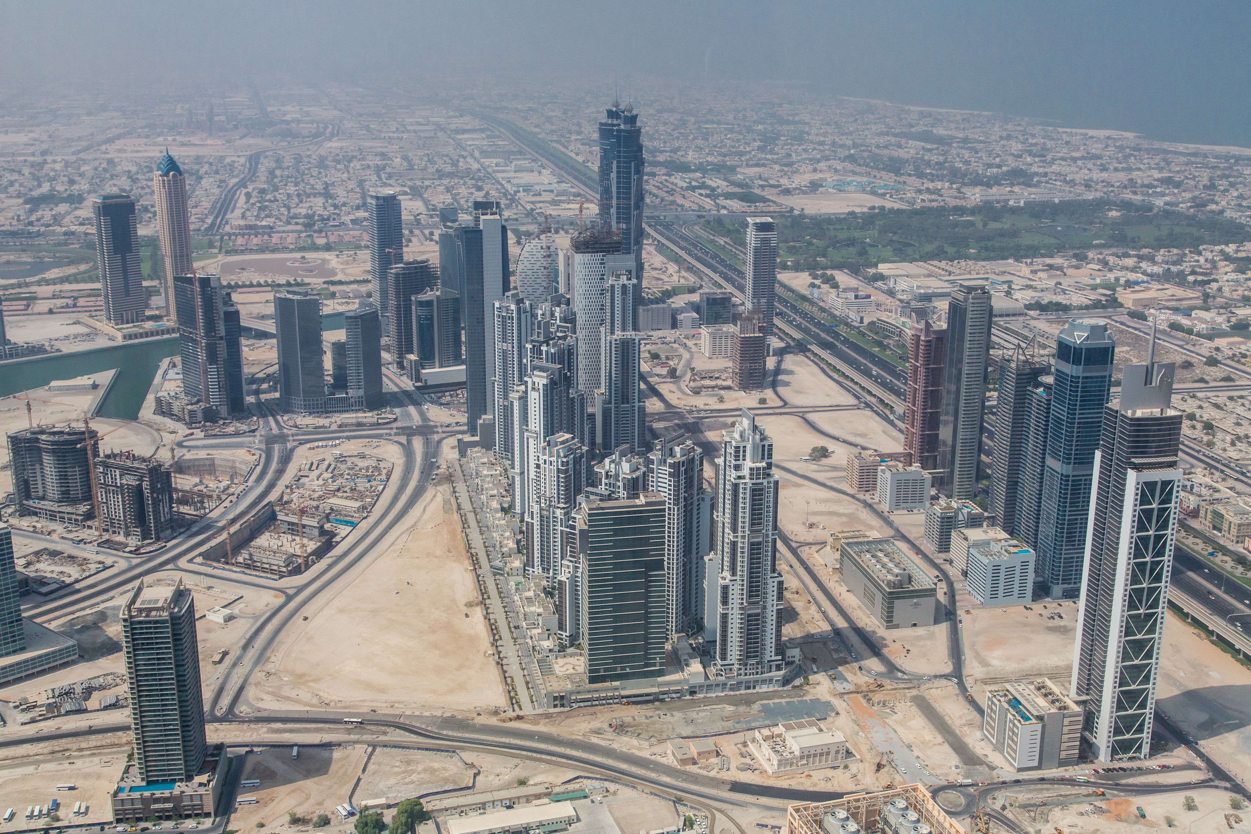 Uae Dubai Developing Buildings In The Desert Field Is Rock