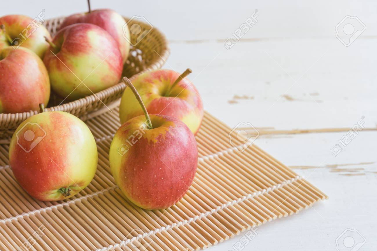 Fresh Red Fuji Apple And In Basket Put On Wood Table For
