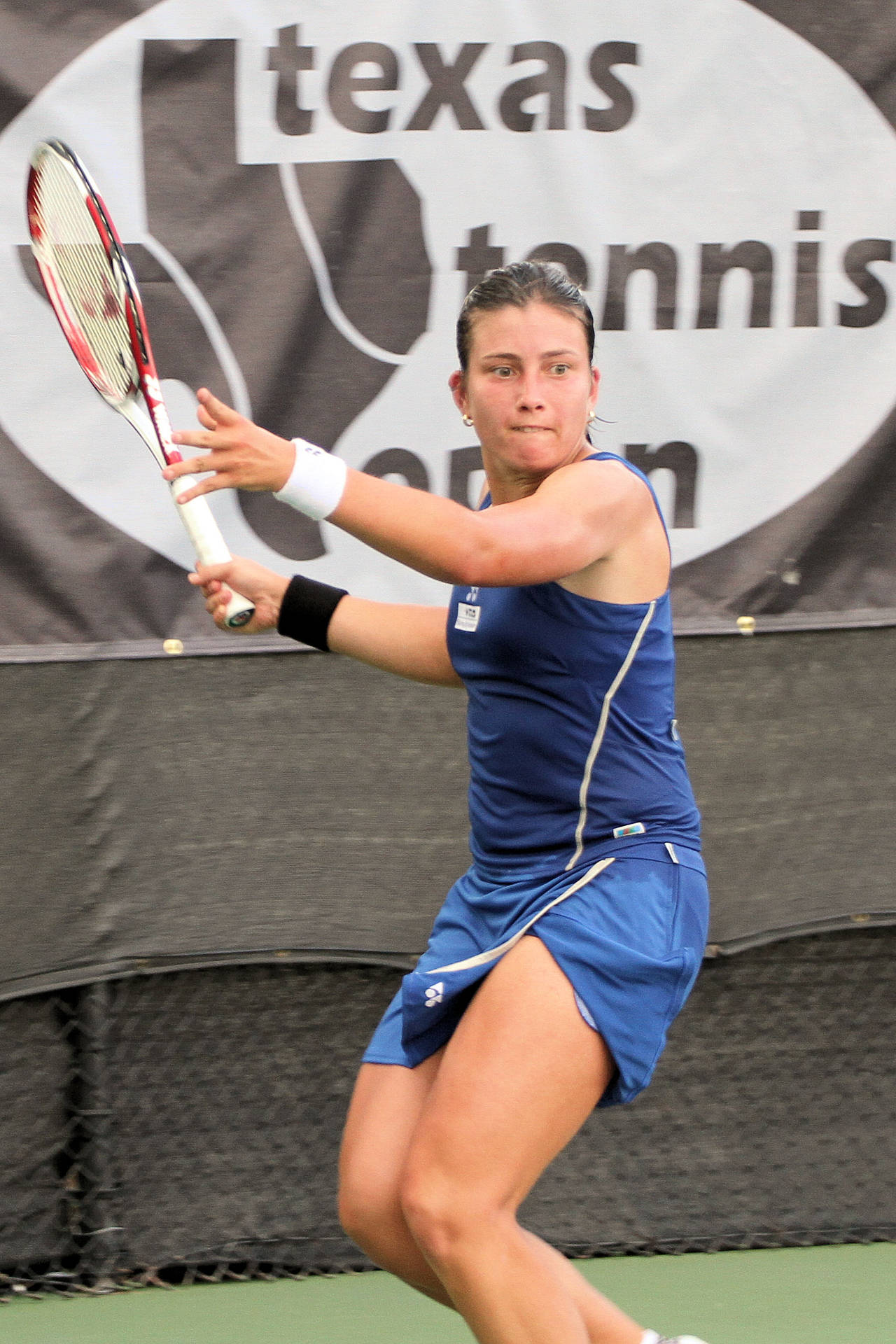 Anastasija Sevastova In Action During A Tennis Match Wallpaper