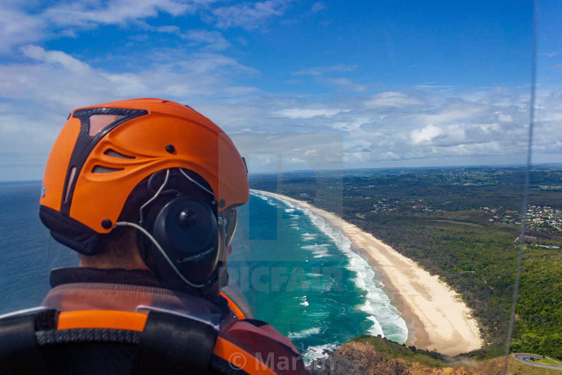 Head Of A Pilot In Gyrocopter With Wategoes Beach The