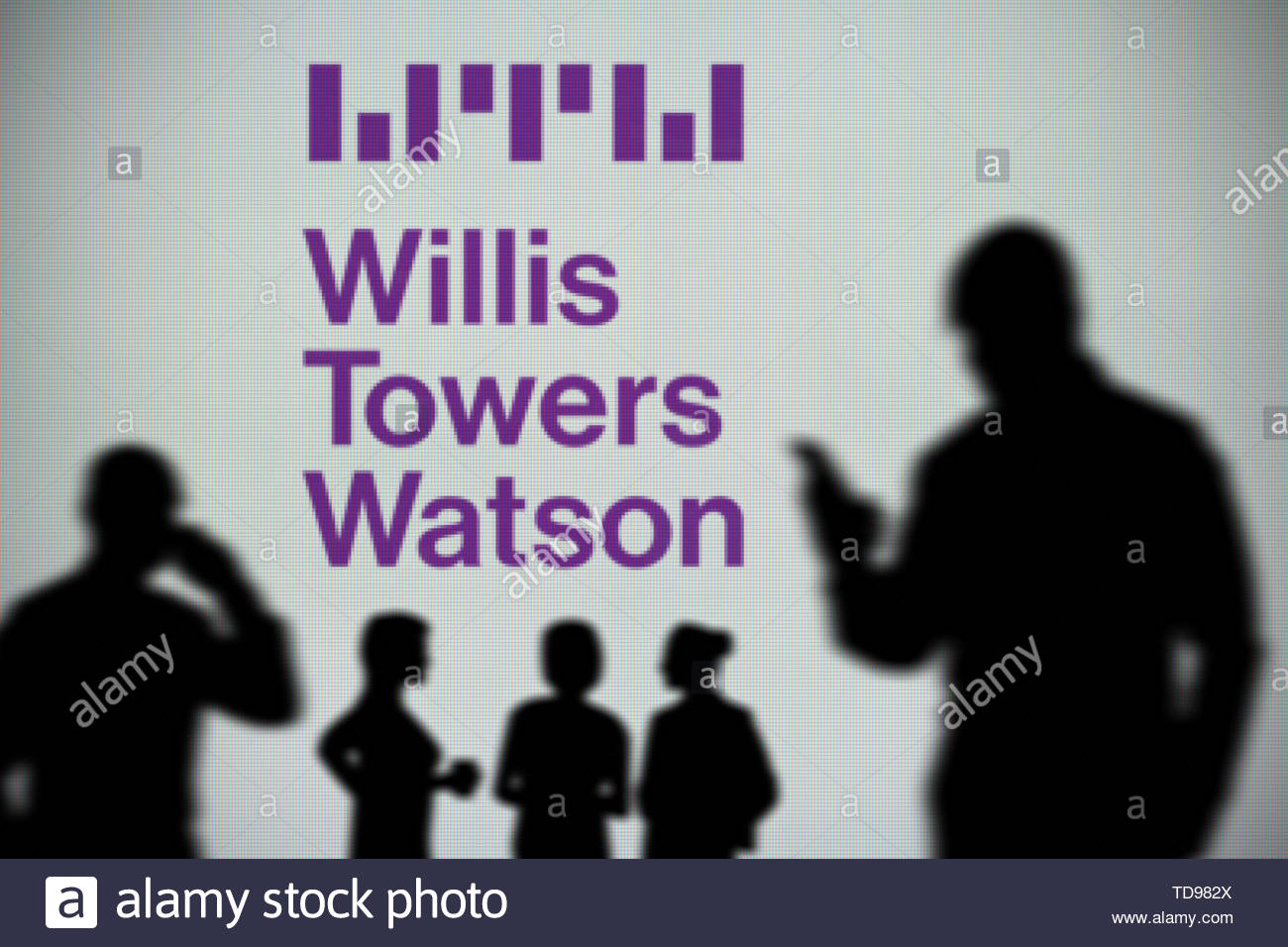 The Willis Towers Watson logo is seen on an LED screen in the
