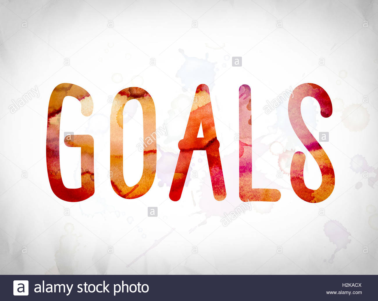 The Word Goals Written In Watercolor Washes Over A White Paper