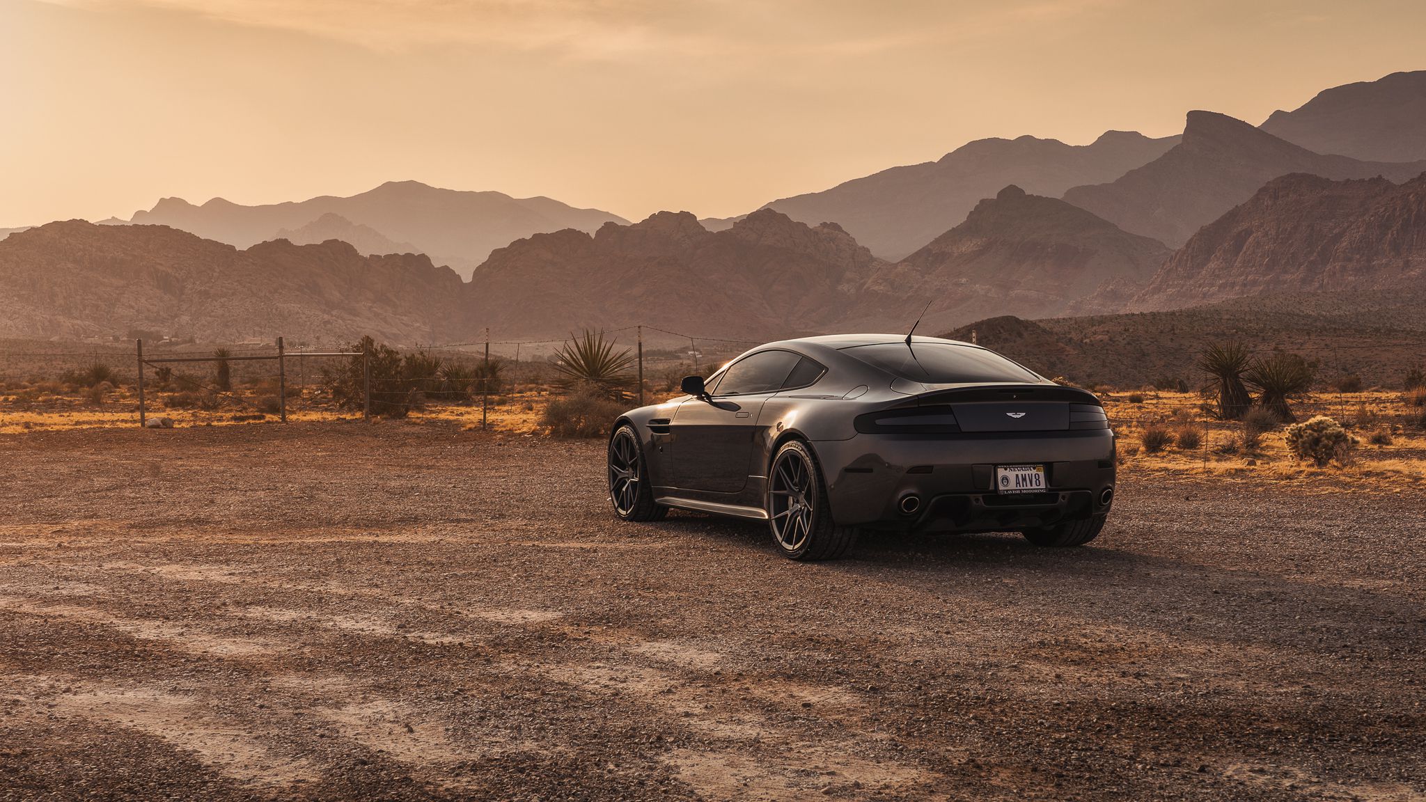 Aston Martin At Canyon Background HD Image