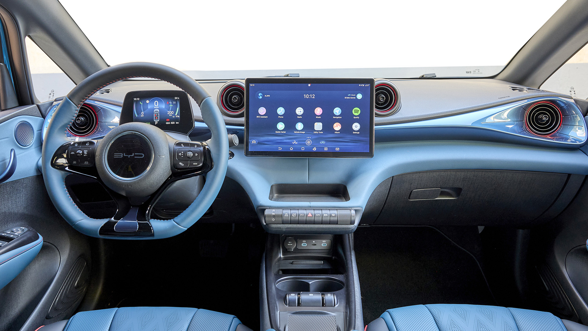 Interior view of a BYD electric car, showcasing its dashboard, infotainment system, and steering wheel