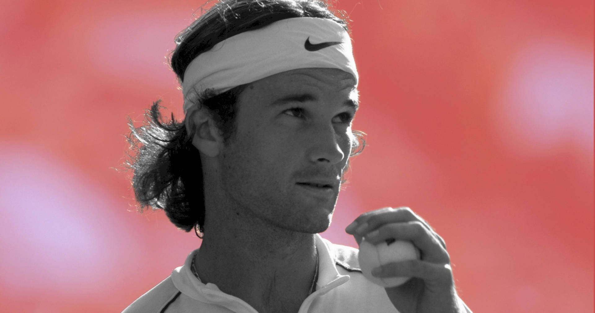 Carlos Moya Showcasing His Tennis Skills In Black And White Wallpaper