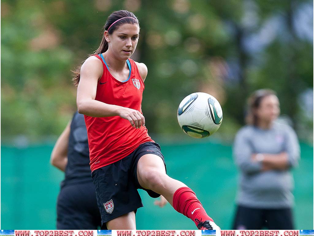 Alex Morgan Playing Football Picture