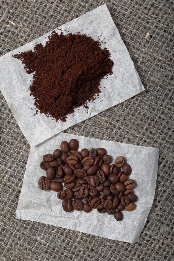Ground Coffee And Grains On A Background Of Coarse Linen