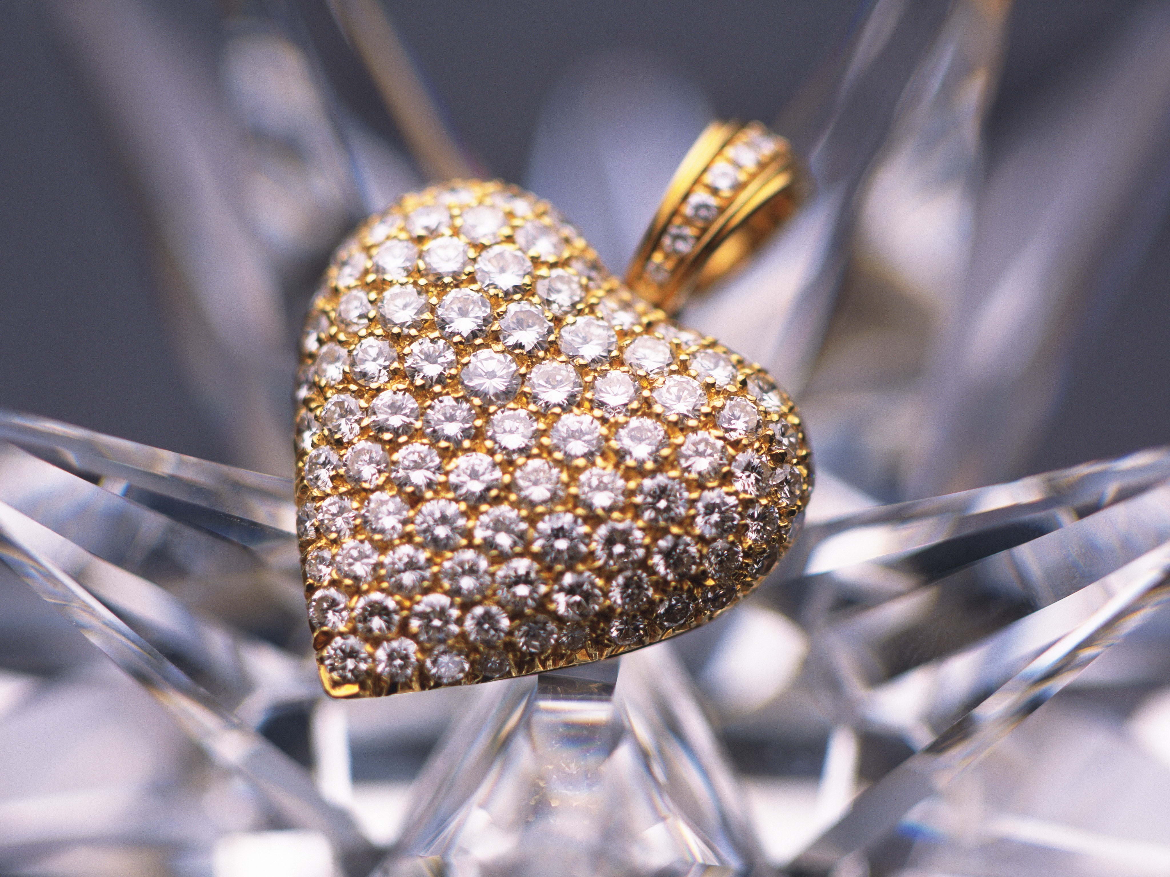 Macro Photography Of Gold With Diamonds Embellished Heart Shaped