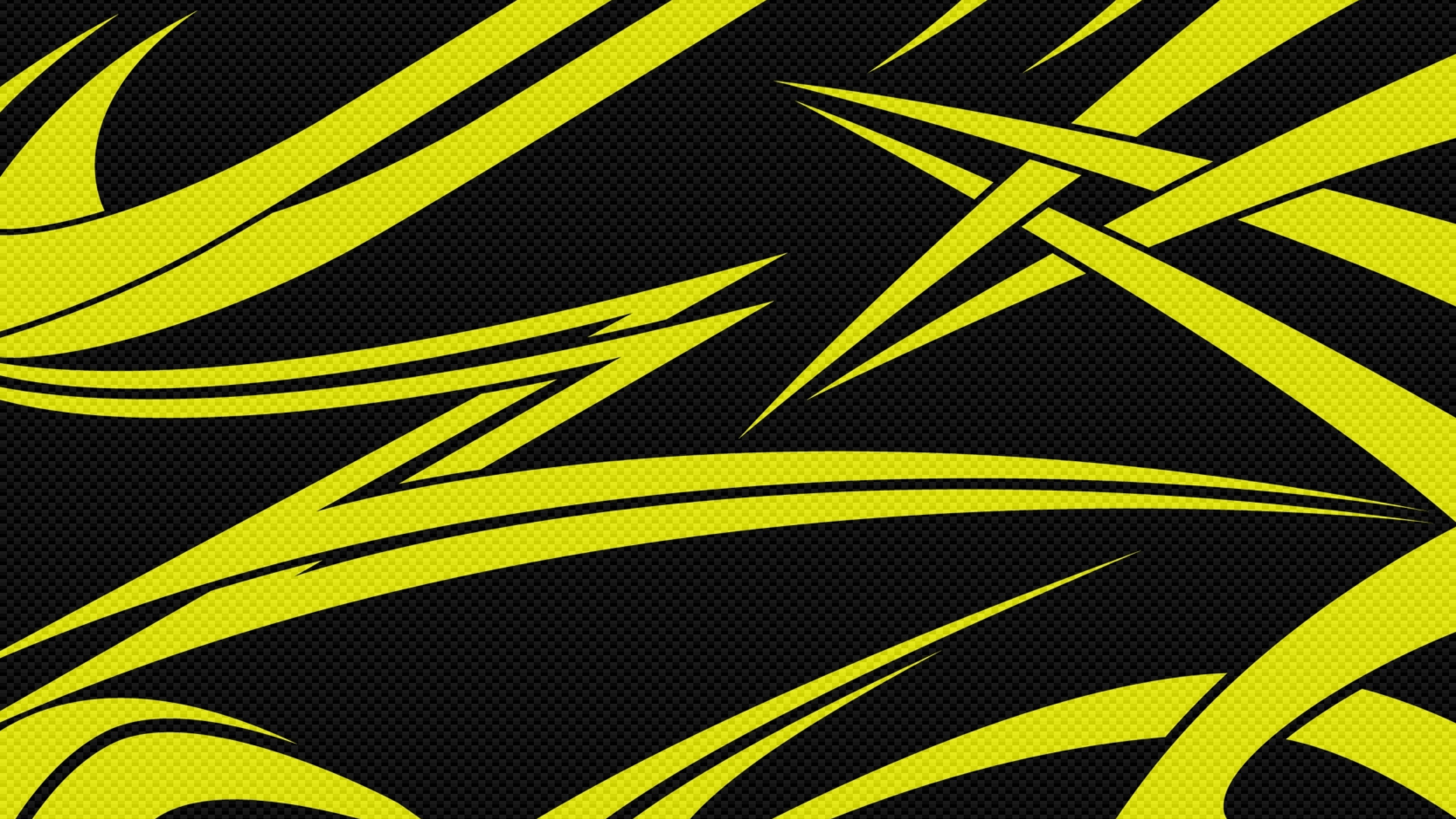 Vibrant neon yellow tribal design on a textured black background