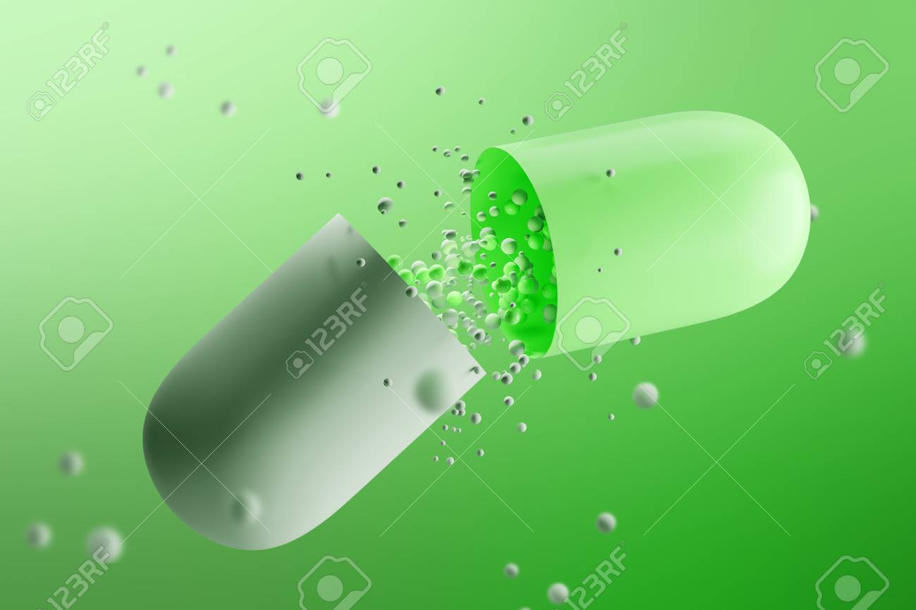 Large Open White And Green Pill With Medicine Leaking From It