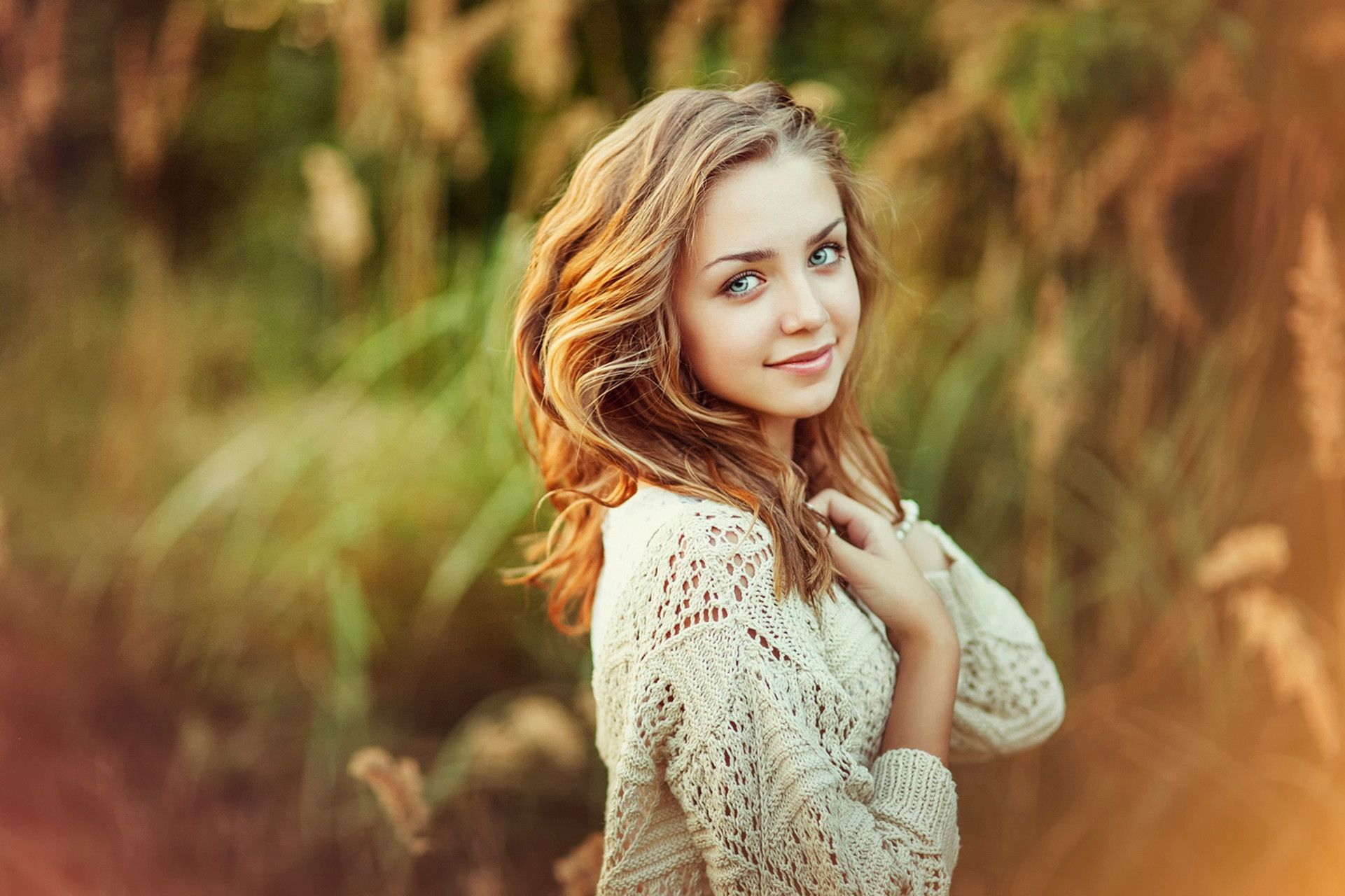 Beautiful Girl in a Knitted Sweater in Nature Wallpaper