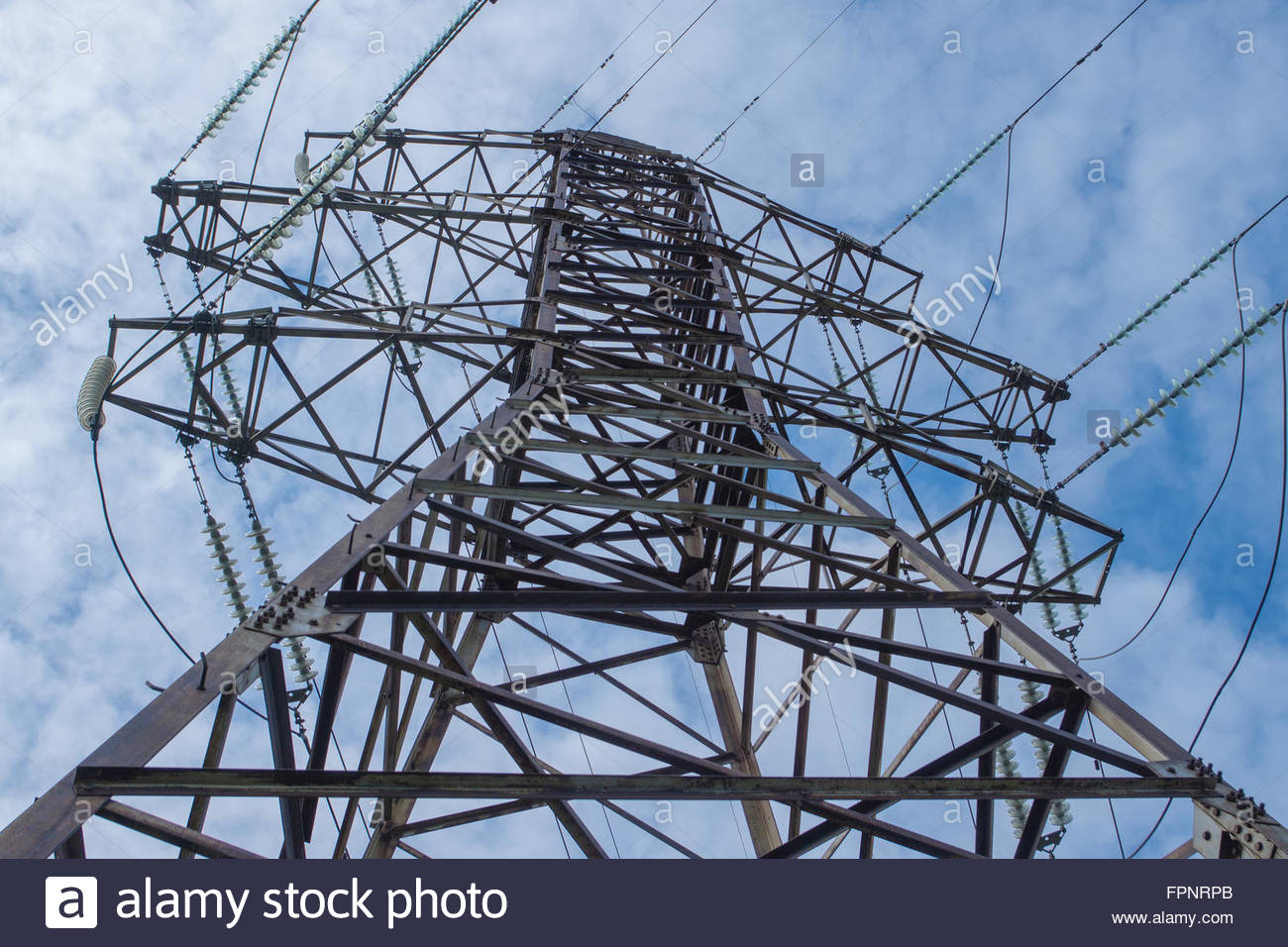 High Voltage Pillar And Wires With Sky Background Stock Photo