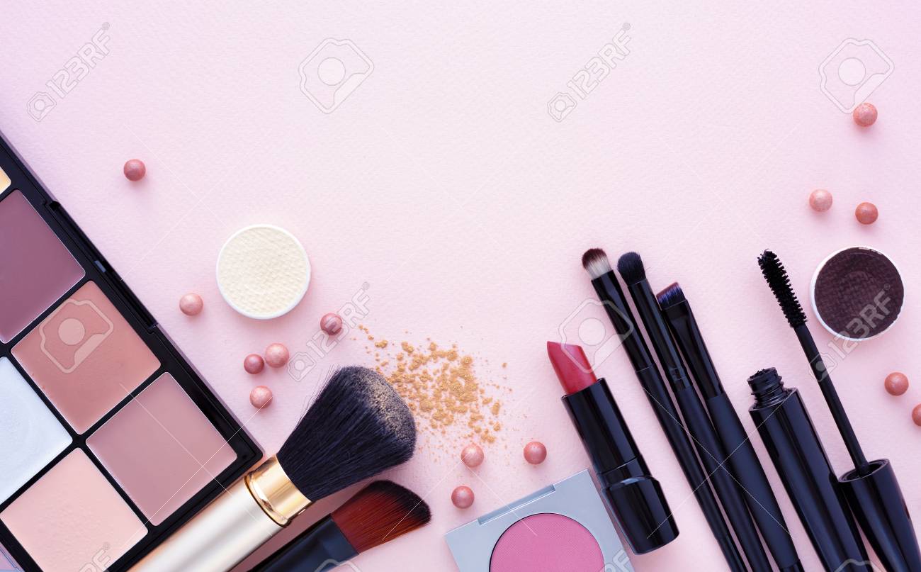 Makeup Brush And Decorative Cosmetics On A Pastel Pink Background