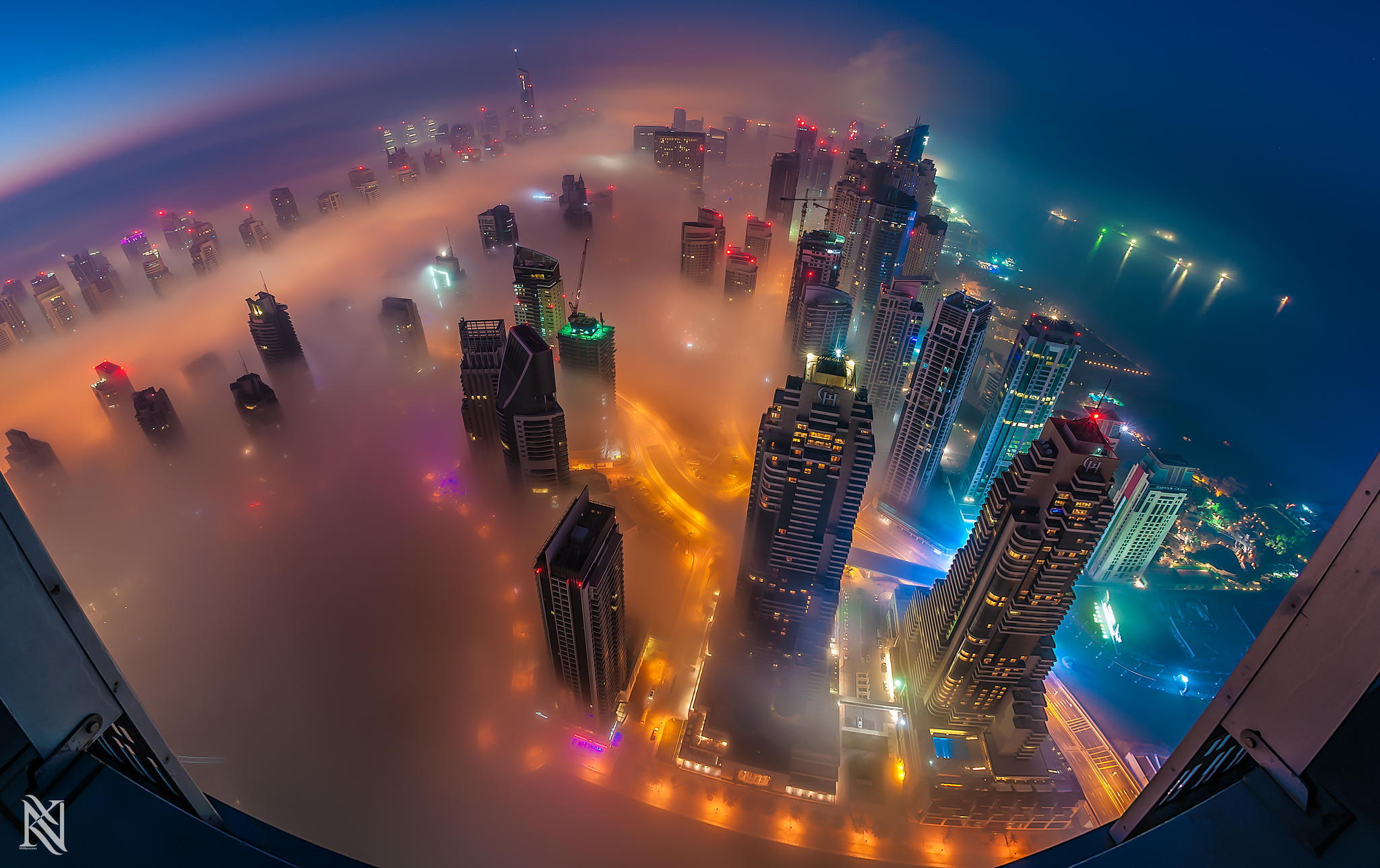 city dubai UAE lights fog city panorama photo