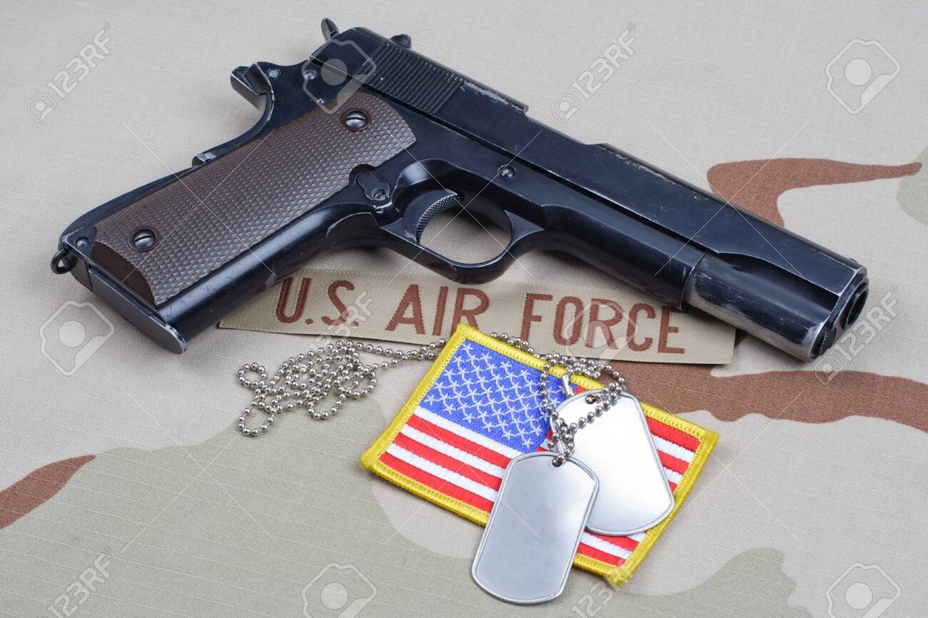 Colt Government With U S Air Force Uniform Background Stock