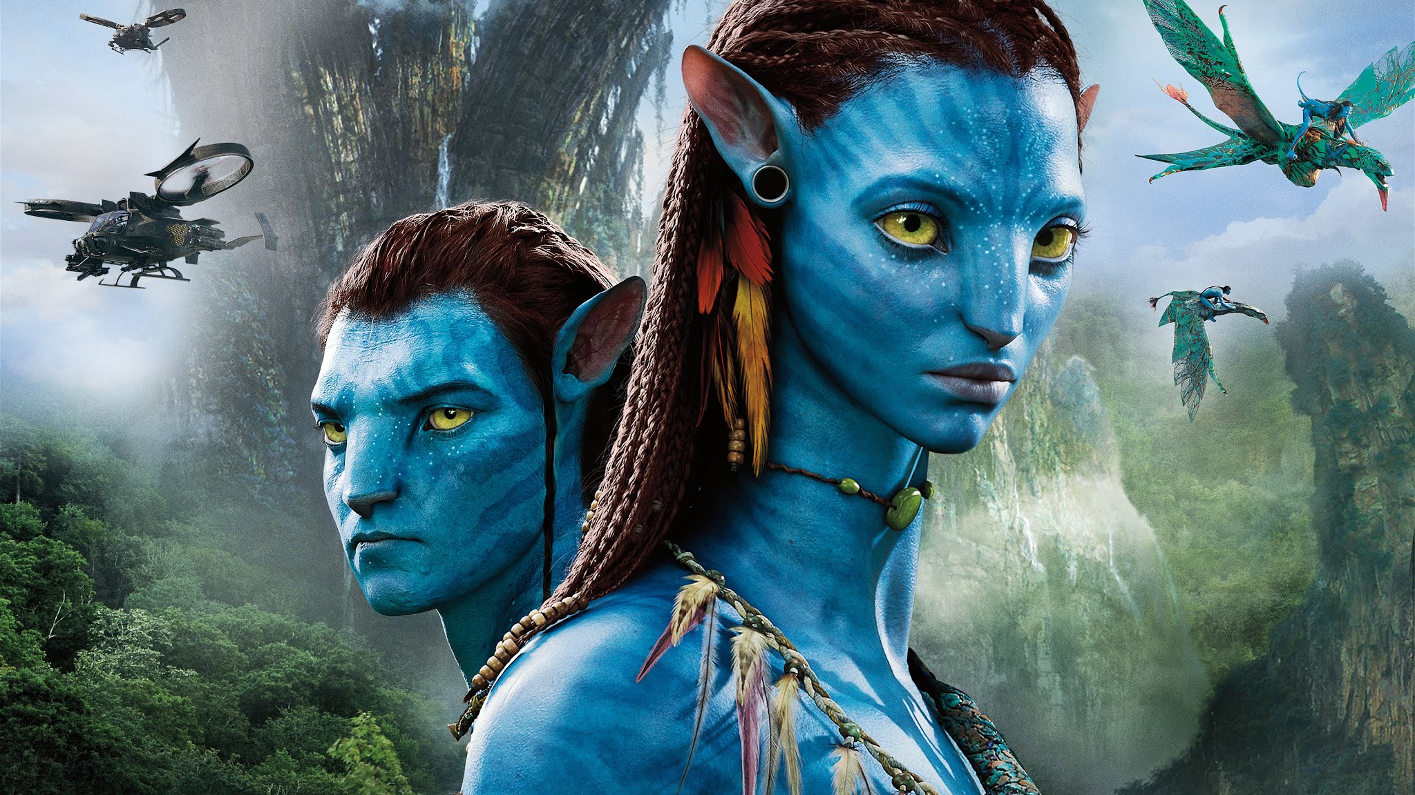 Neytiri and Jake Sully, the main characters from the movie Avatar, stand side by side against the backdrop of Pandora's lush landscape