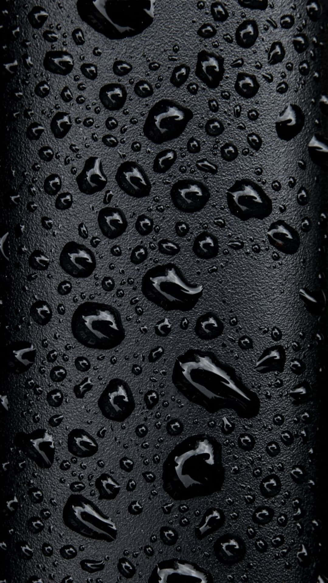 Stylish Black iPhone Against A White Background Wallpaper