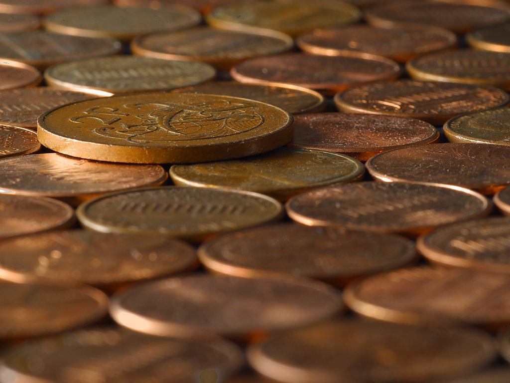 Copper Coins And Pennies Background Image Wallpaper Or Texture