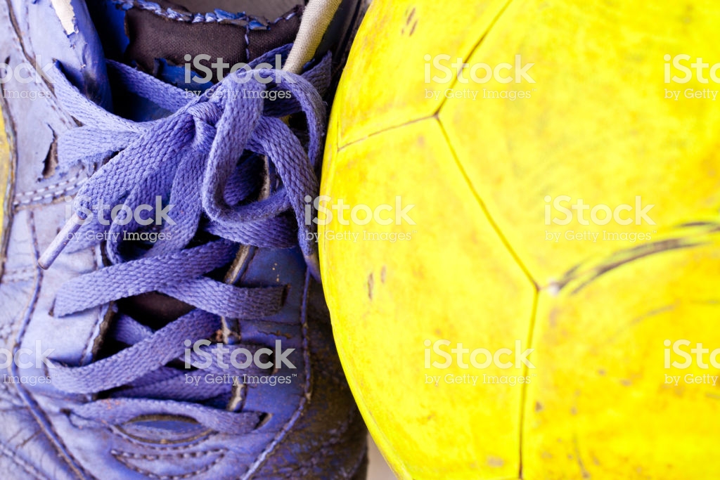 Old Blue Futsal Shoes Yellow Ball On White Background