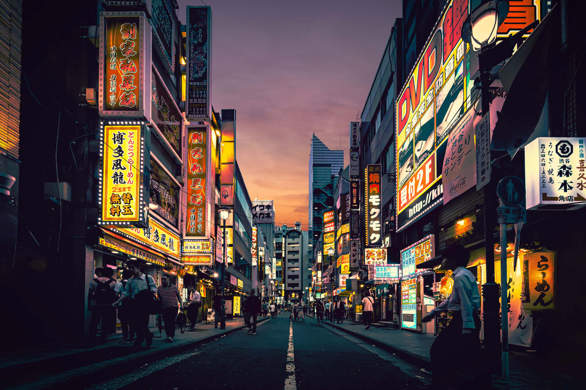 Vibrant Scene Of Neon Lights In Tokyo Japan Wallpaper