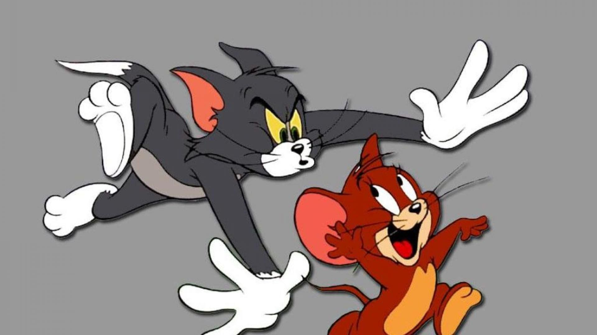Tom and Jerry chasing each other in high-definition 4k wallpaper