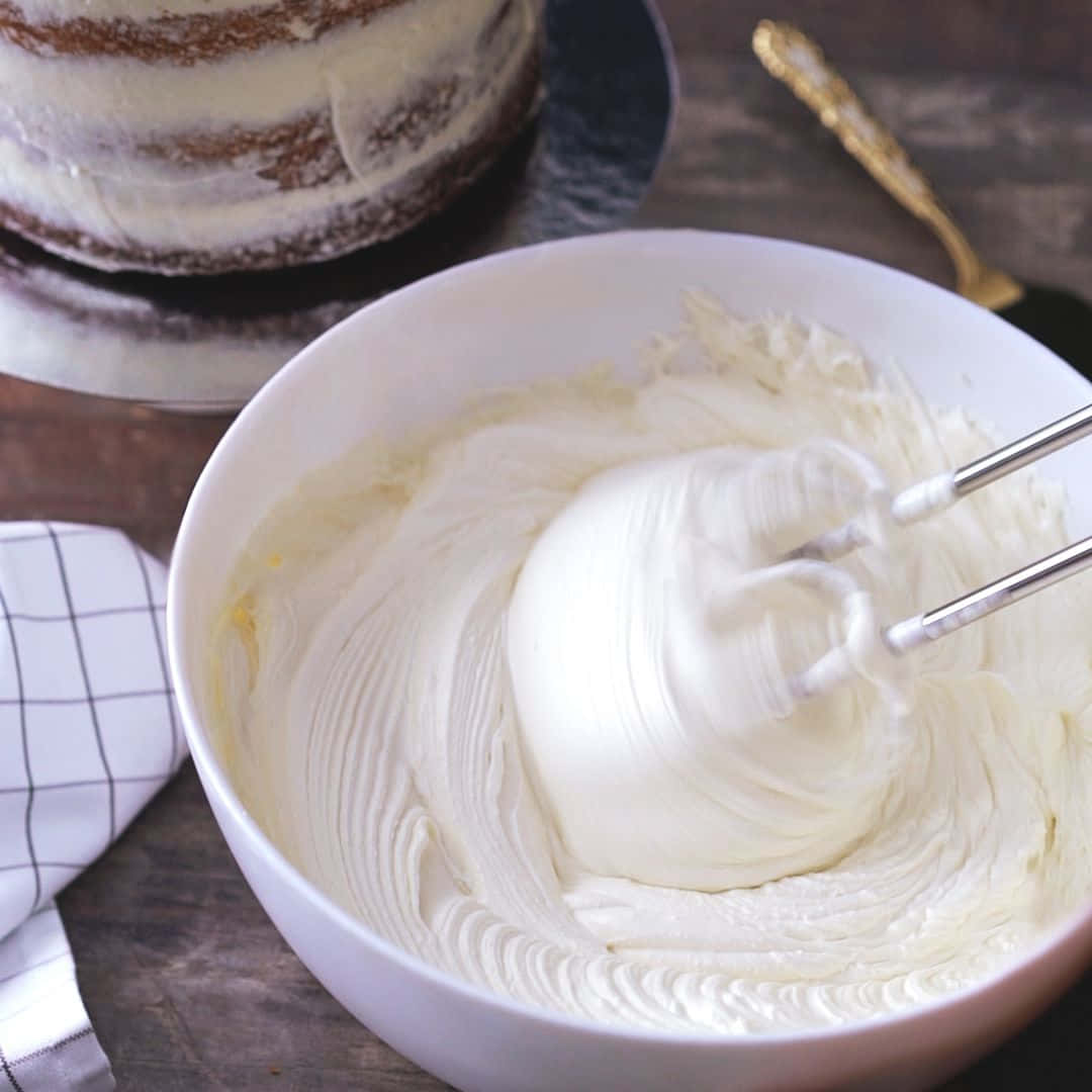 Enjoy A Cup Of Delicious Buttercream Coffee Wallpaper