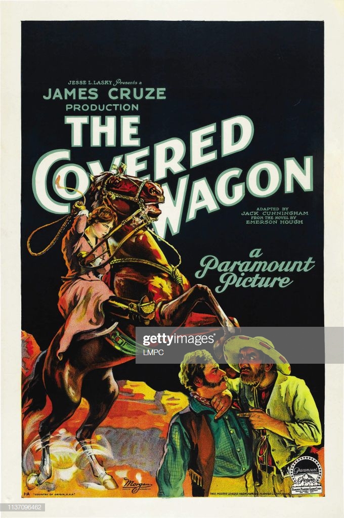 The Covered Wagon Poster Background Left Lois Wilson On Horse