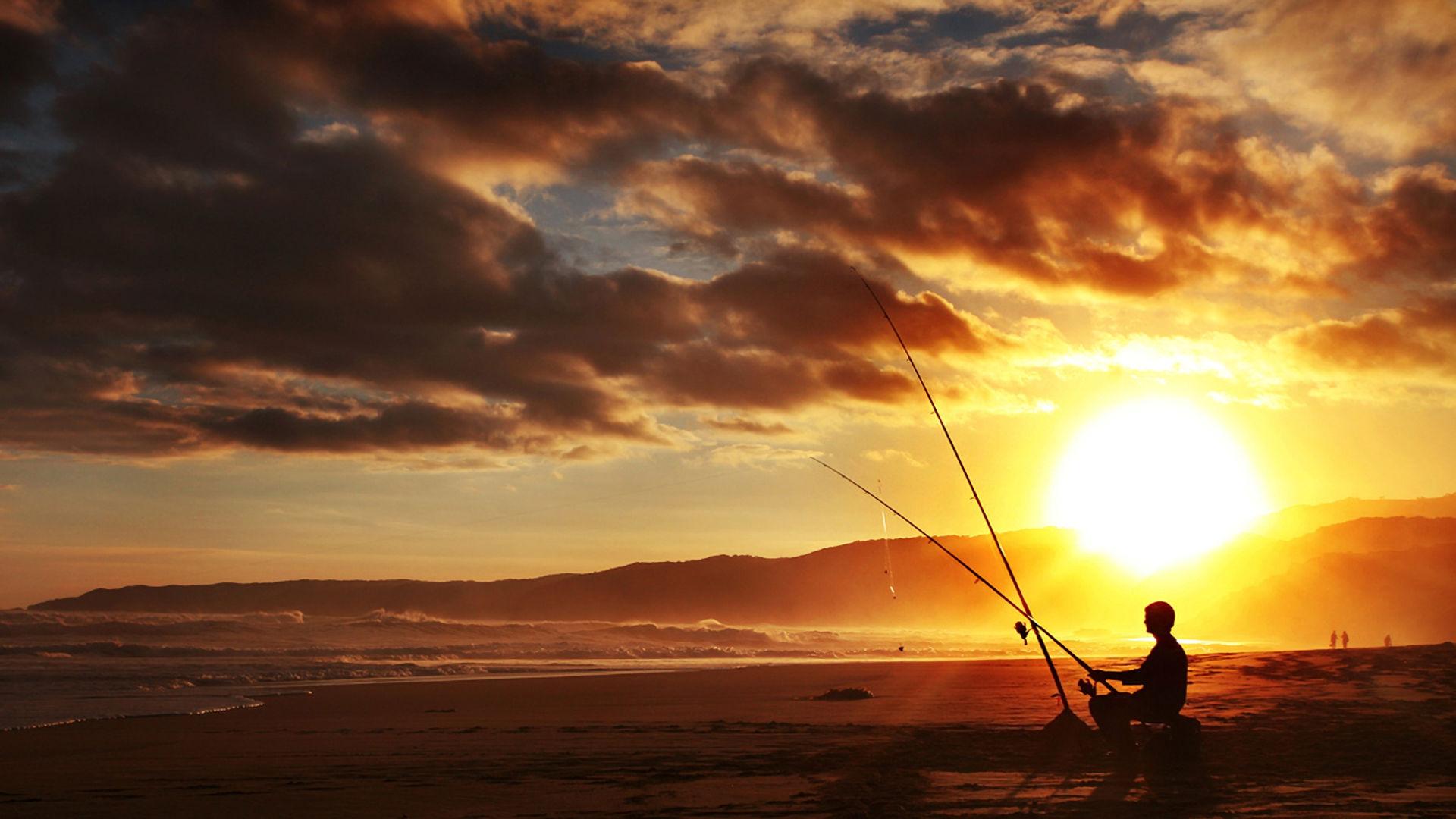 Man Fishing On Beach In Sunset HD Wallpaper
