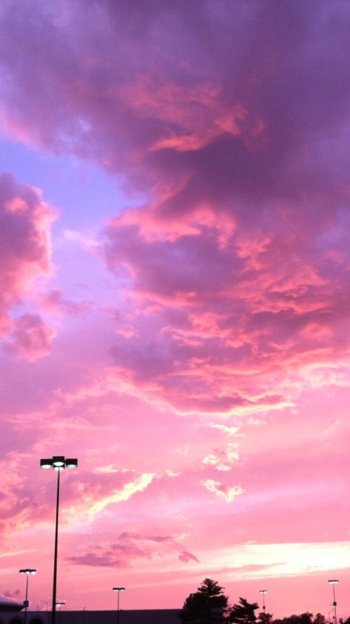 Aesthetic iPad Wallpaper With A Purple And Pink Clouds In The Sky