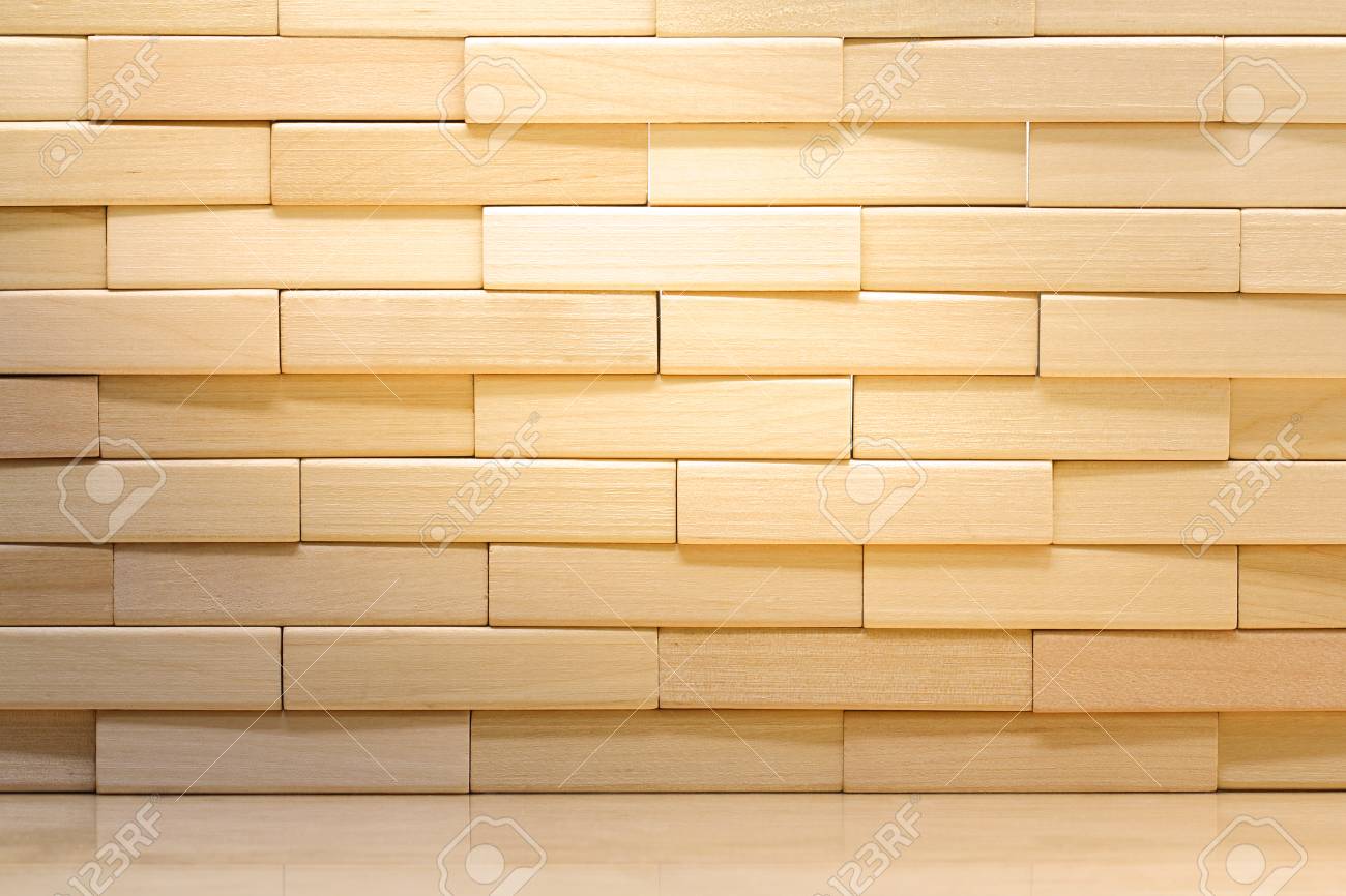 Wooden Brick Wall Made From Wood Blocks Under Sunlight For