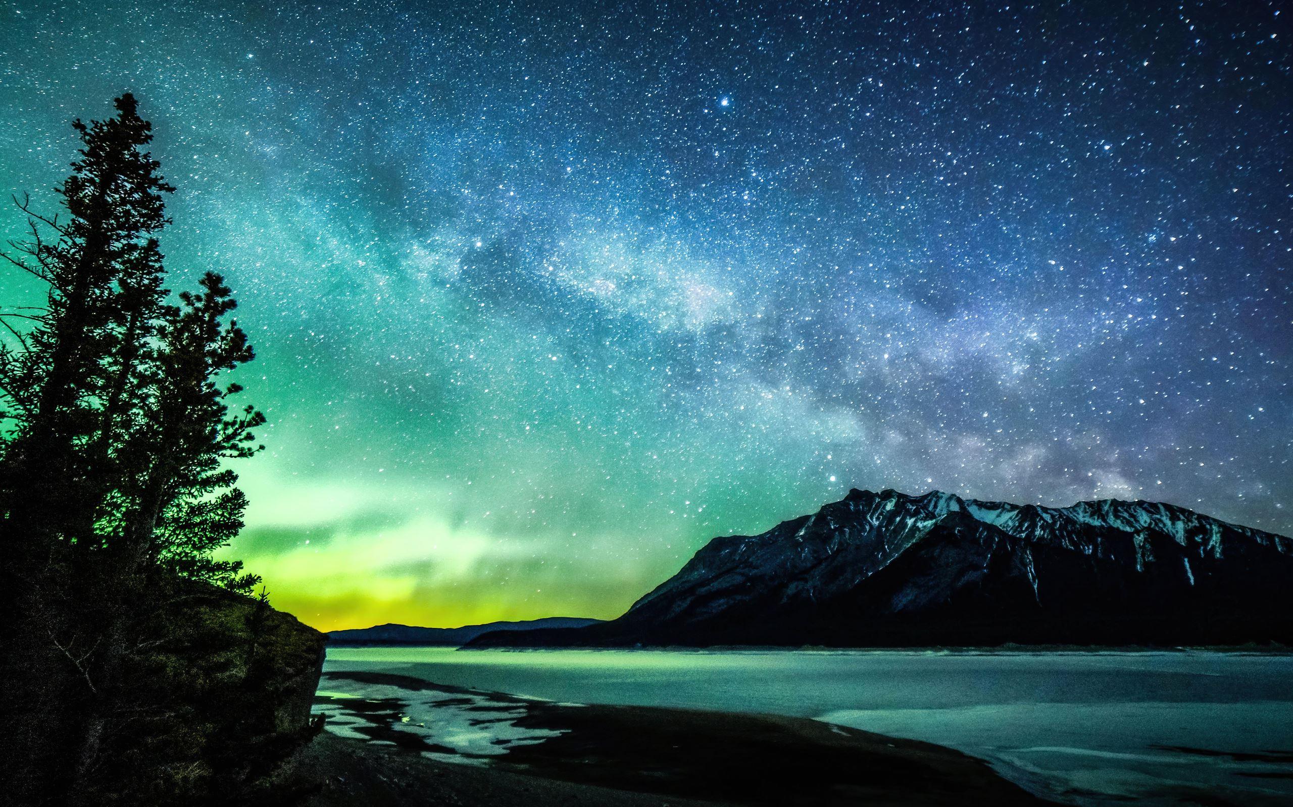 Aurora And The Milky Way Abraham Lake 8k Macbook Air Wallpaper