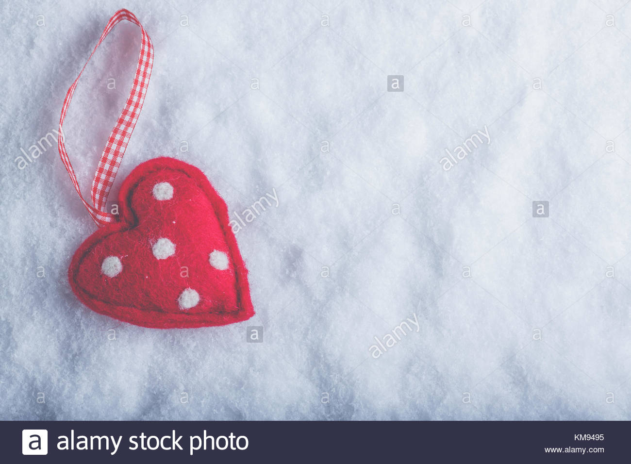 Red Toy Suave Heart On A Frosty White Snow Winter Background Love