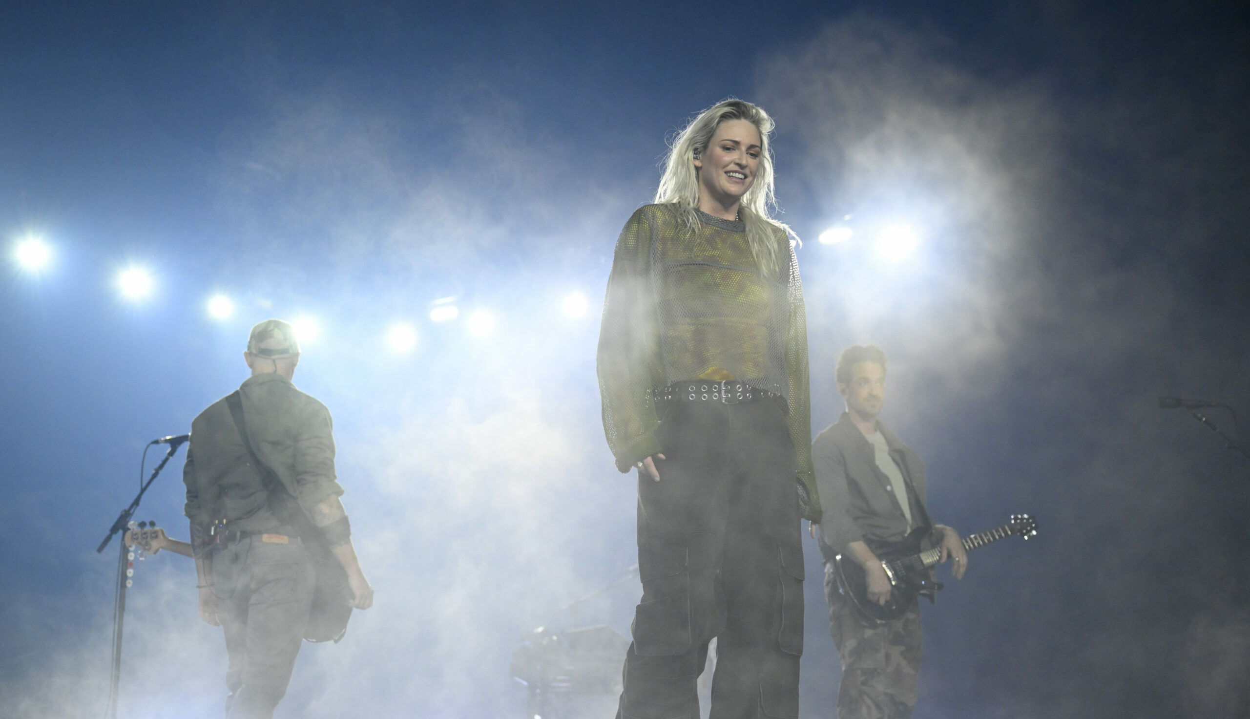 Emily Armstrong performing on stage with her band, Dead Sara
