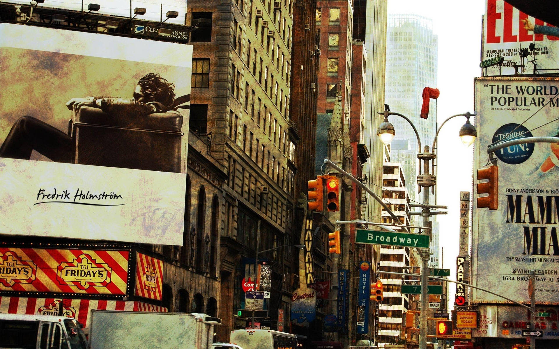 A view of Broadway street in New York City with its iconic theaters, billboards, and bustling atmosphere
