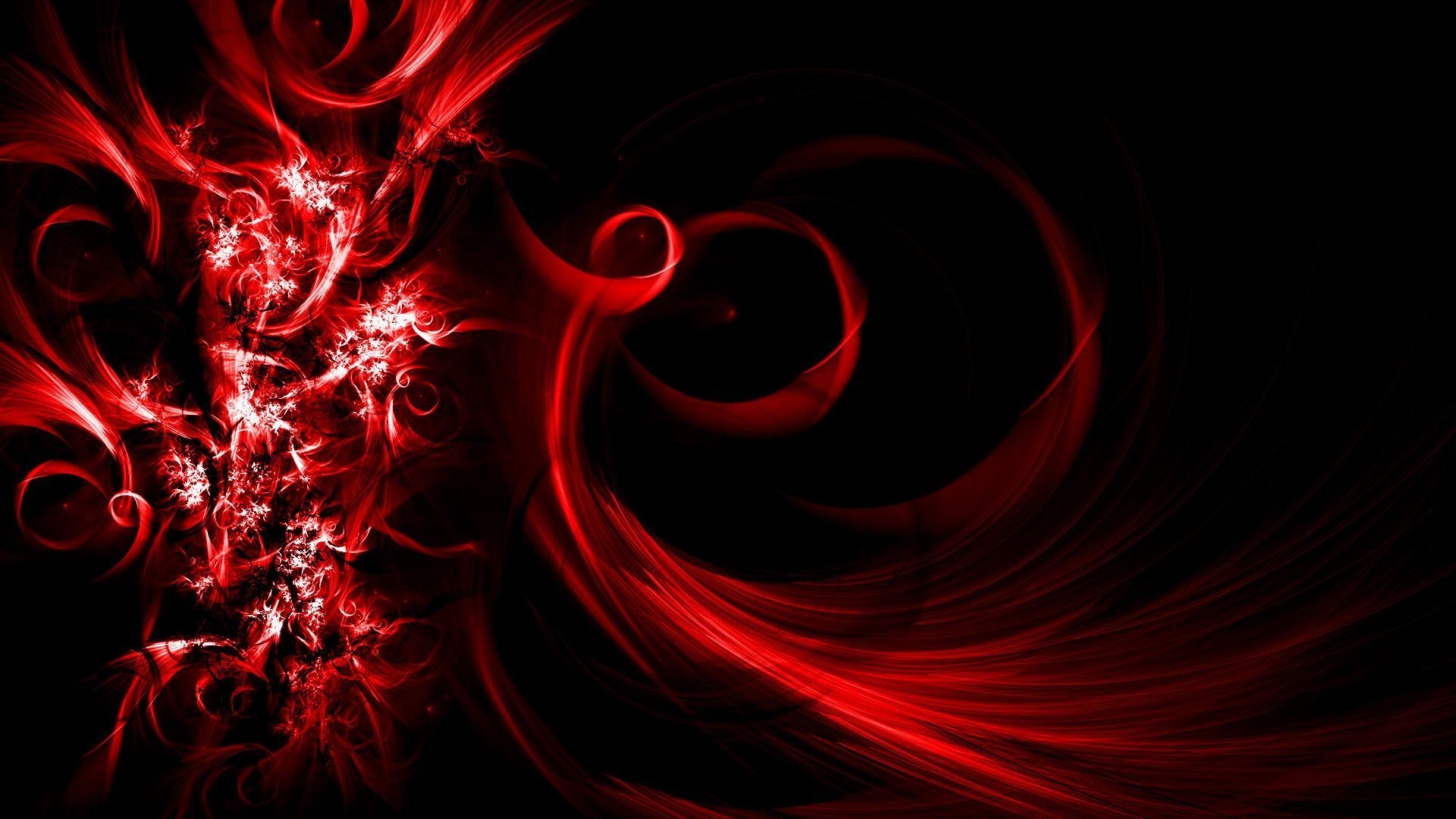 A vibrant red abstract design swirls against a black background, creating a dynamic and energetic visual