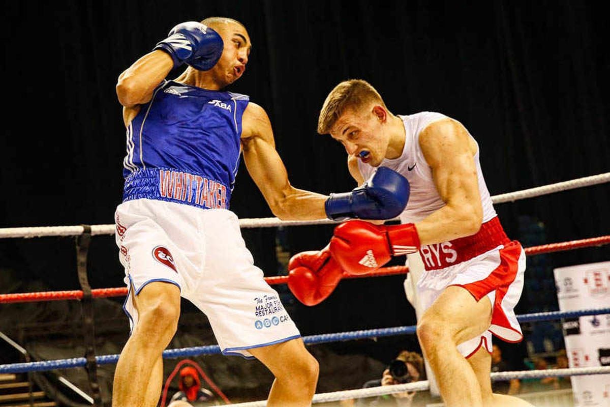 Benjamin Whittaker lands a punch on his opponent during a boxing match