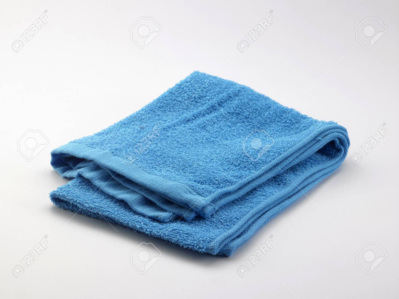 Folded Towel Isolated On White Background Stock Photo Picture And