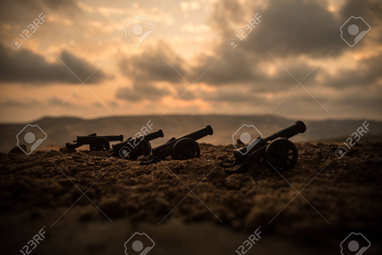 War Concept Old Artillery Cannon Guns On Fog Sky Background