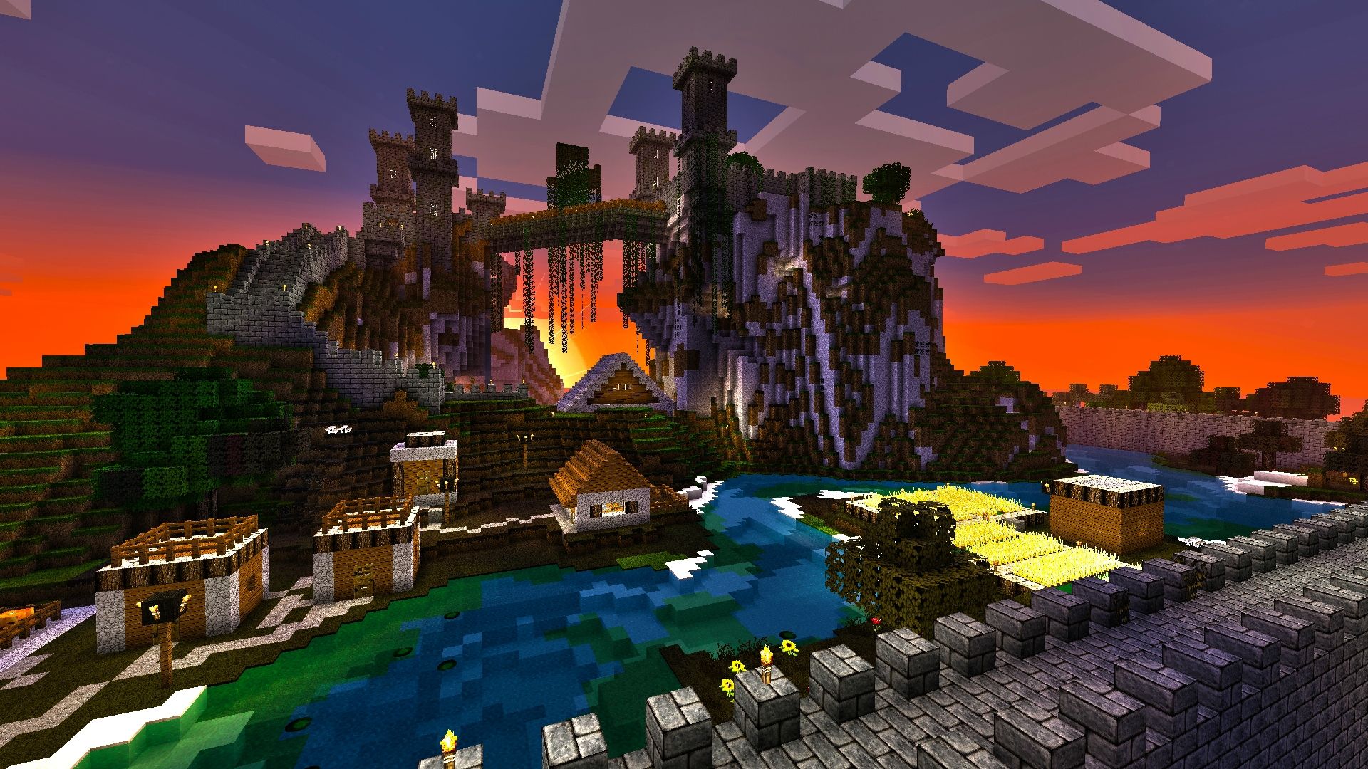 A stunning HD Minecraft wallpaper showcasing a castle overlooking a village and a river at sunset