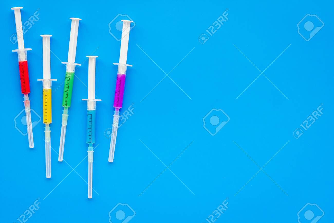 Vaccination Immunization Syringe With Colored Medicament On