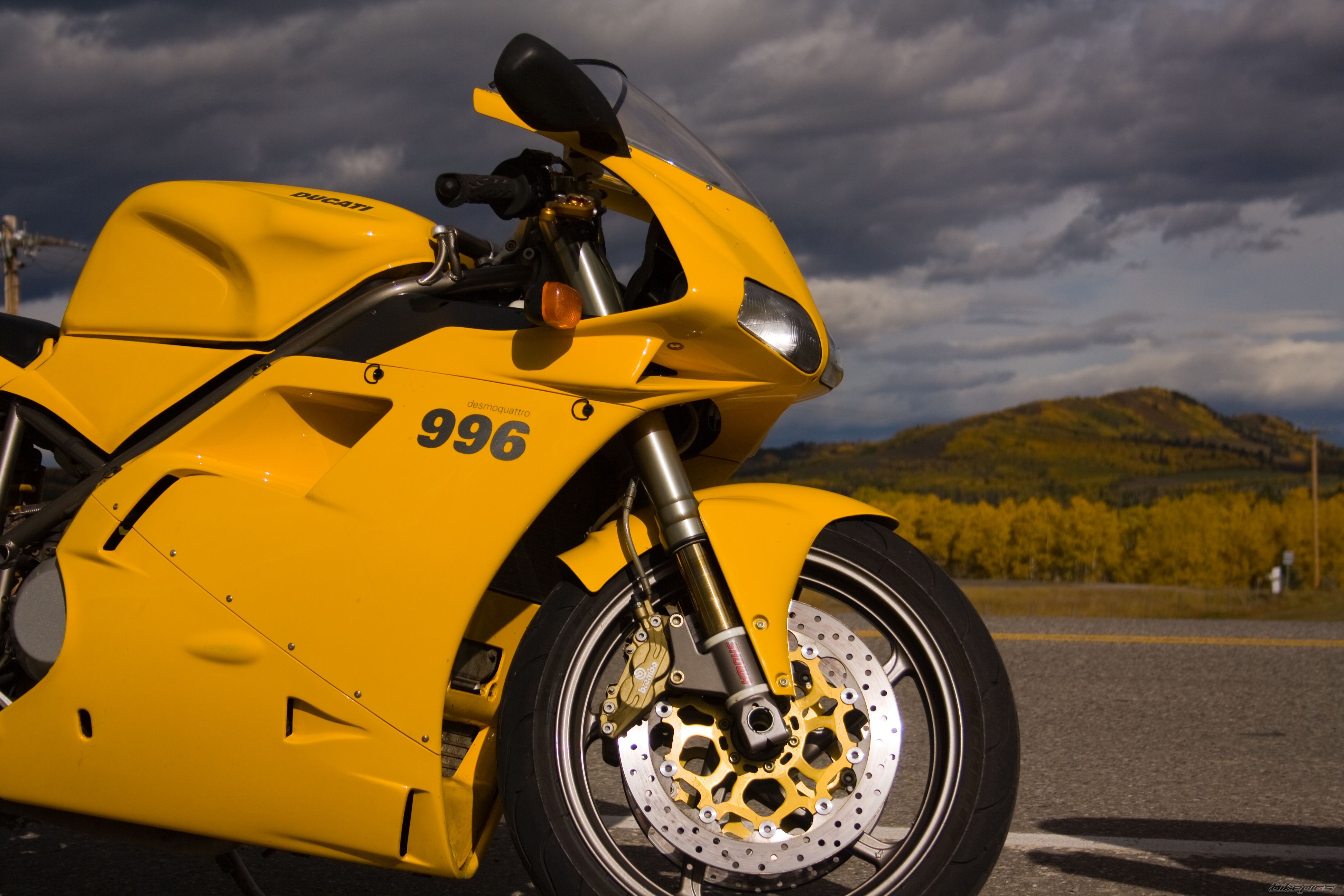 Yellow Ducati 996 Motorcycle Parked on Roadside