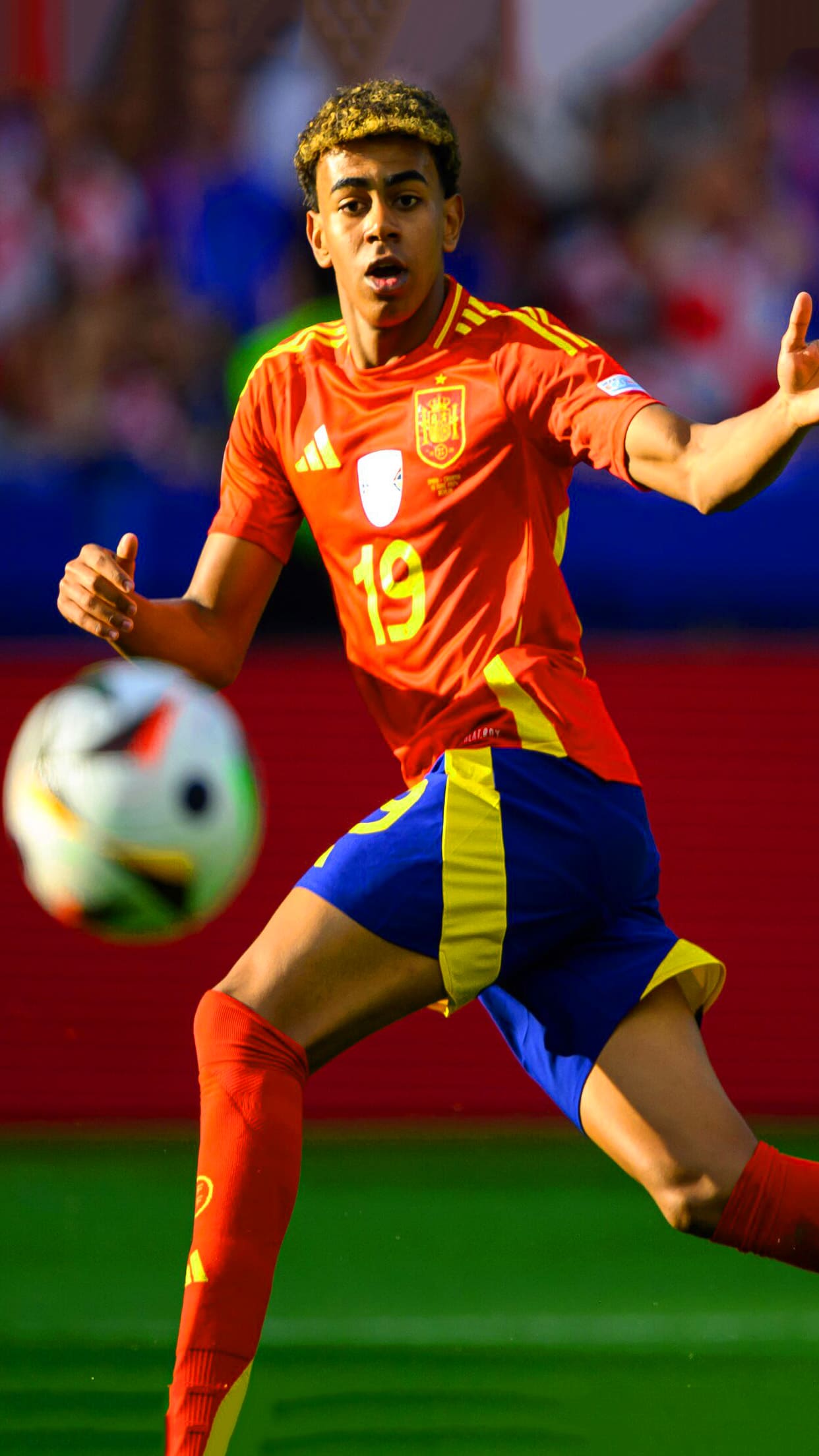 Lamine Yamal of Spain in action during a football match