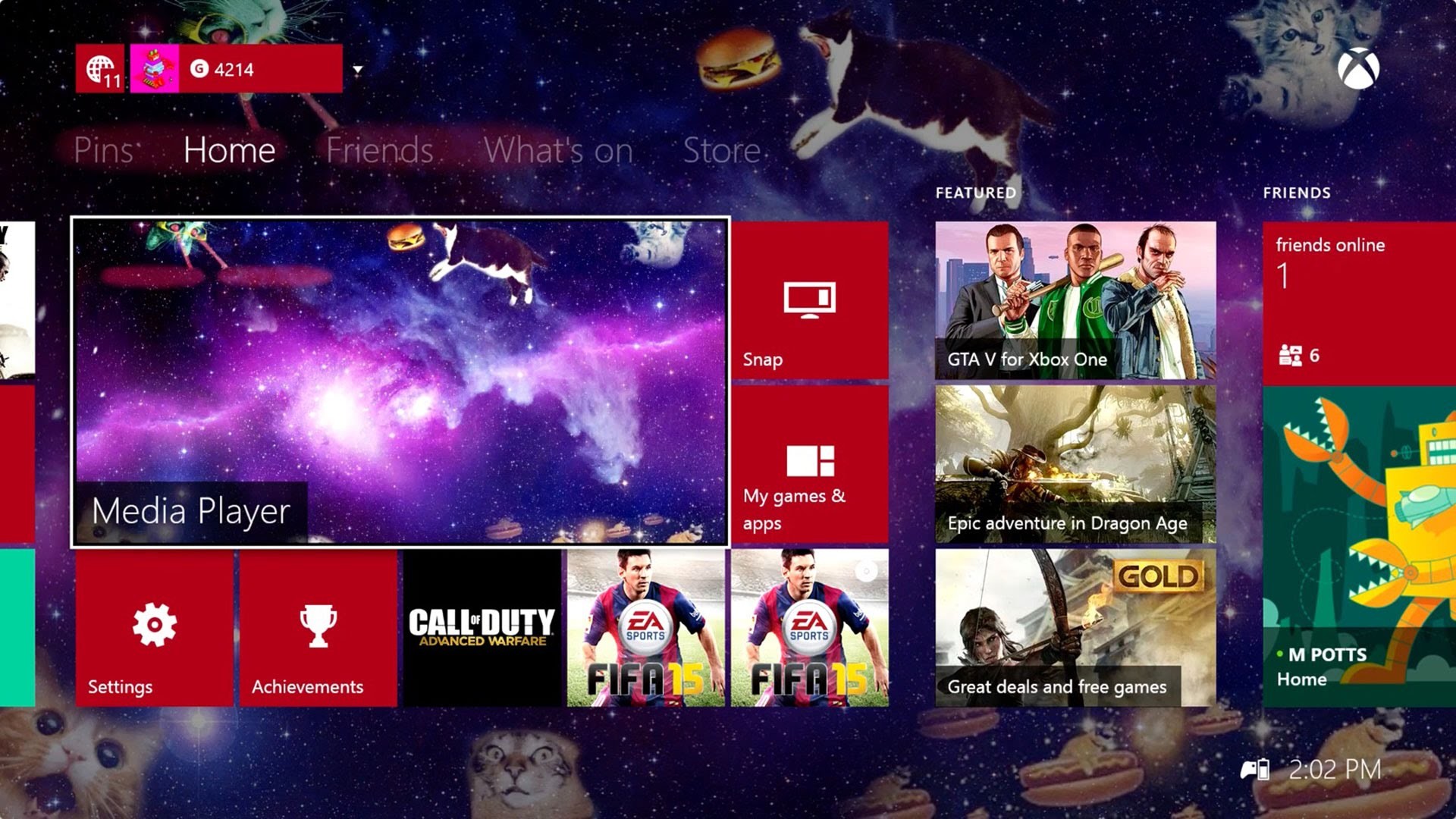 Custom Xbox One dashboard background with a galaxy theme, featuring cats, burgers, and game tiles like GTA V, FIFA 15, and Call of Duty