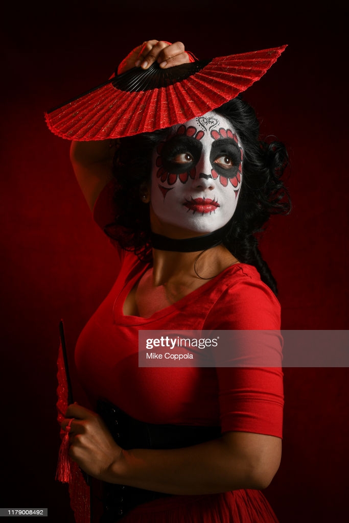A cosplayer as Maria Salazar from Deadly Class poses during New