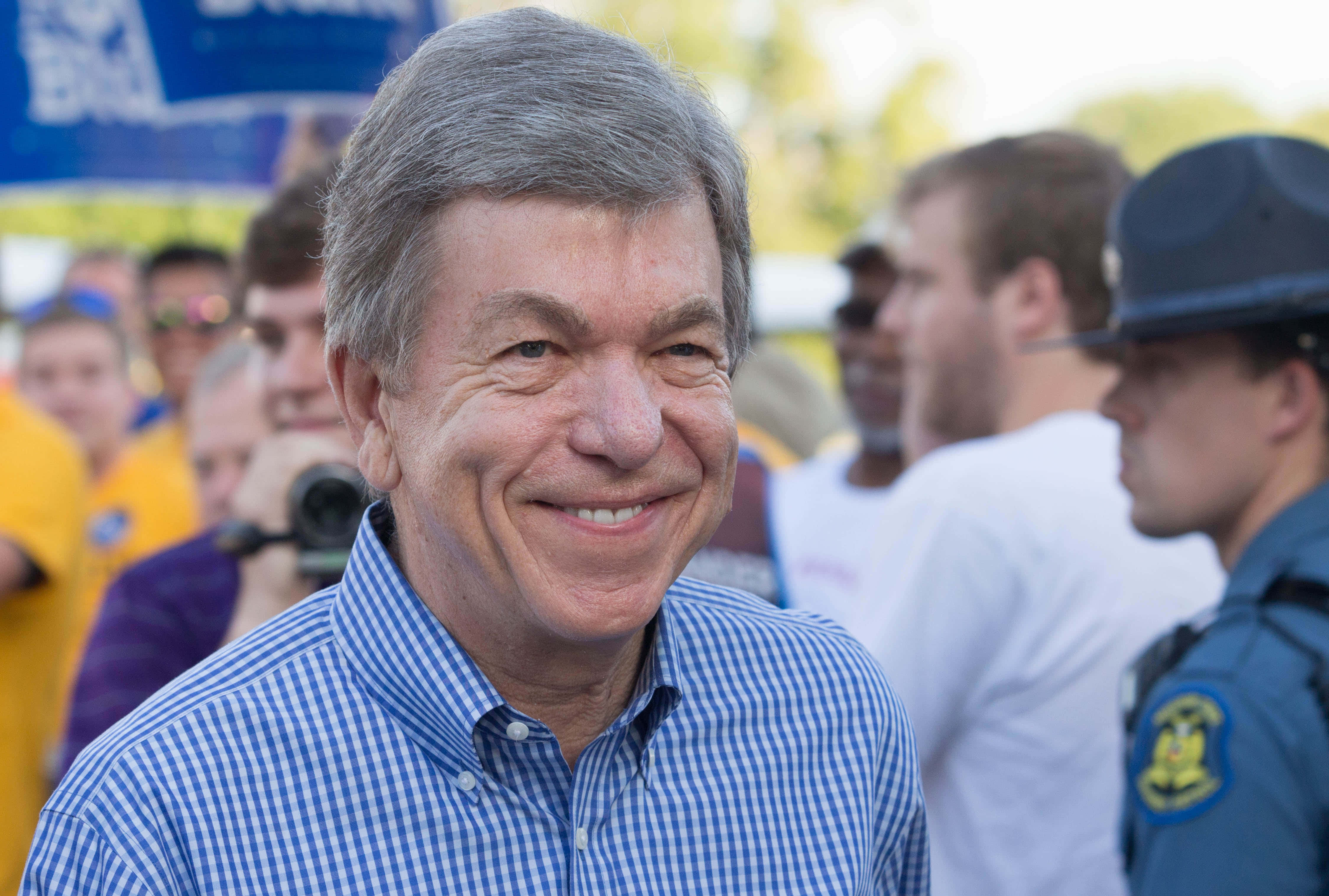 Roy Blunt Smiling Whilst Outside Wallpaper
