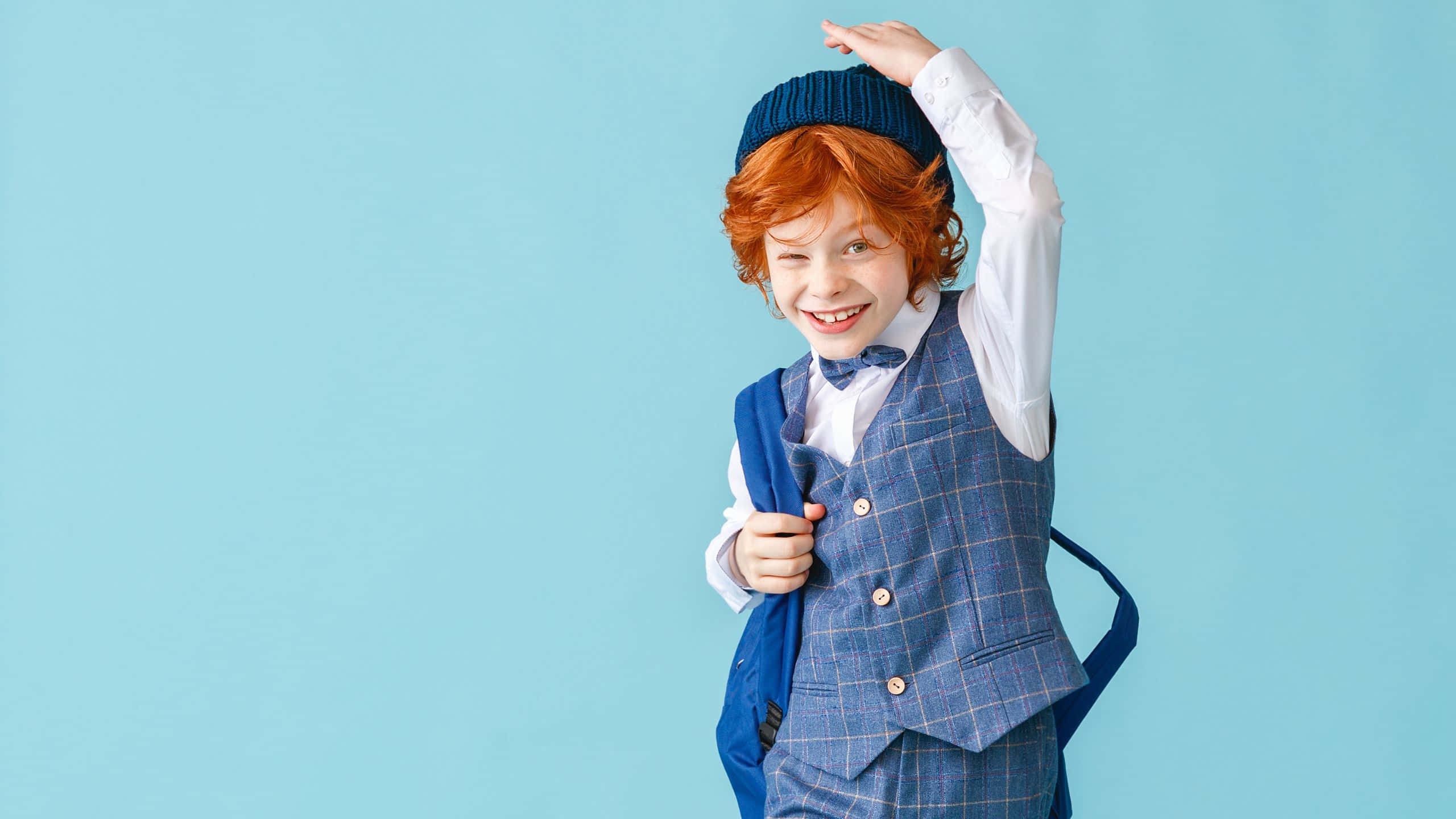 Stylish Boy In School Outfit Wallpaper