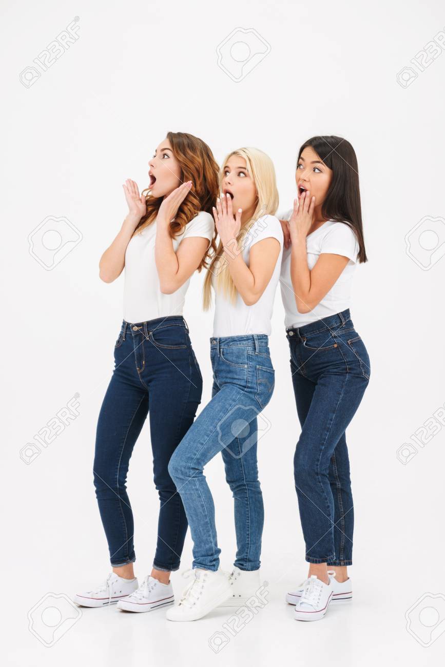Photo Of Three Young Shocked Pretty Girls Friends Standing